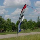 Wind Feather Sign - Welcome Rental Cincinnati Ohio